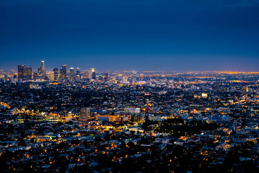 The lights of Los Angeles under a deep blue evening sky